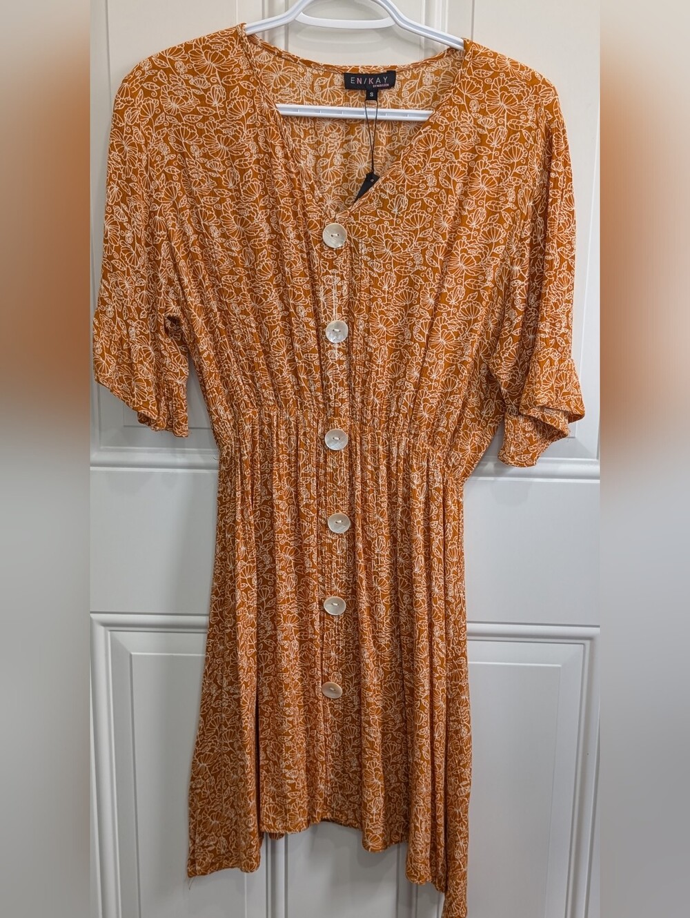 En/Kay by Navleen mustard-colored V-neck dress featuring 3/4 flutter sleeves
